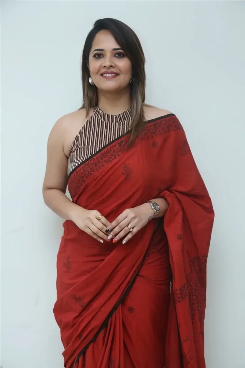 Hyderabad Girl Anasuya Bharadwaj in Red Saree at Movie Press Meet